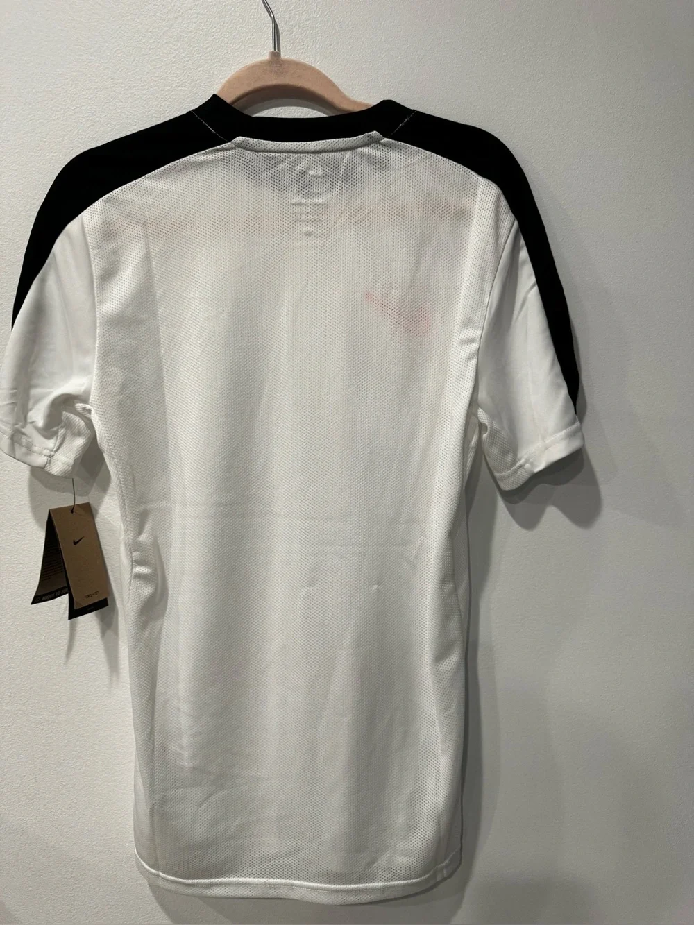 Nike Men’s White Short-Sleeve Training Shirt with Black Trim and Red Swoosh